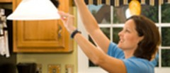 Dusting kitchen lamp