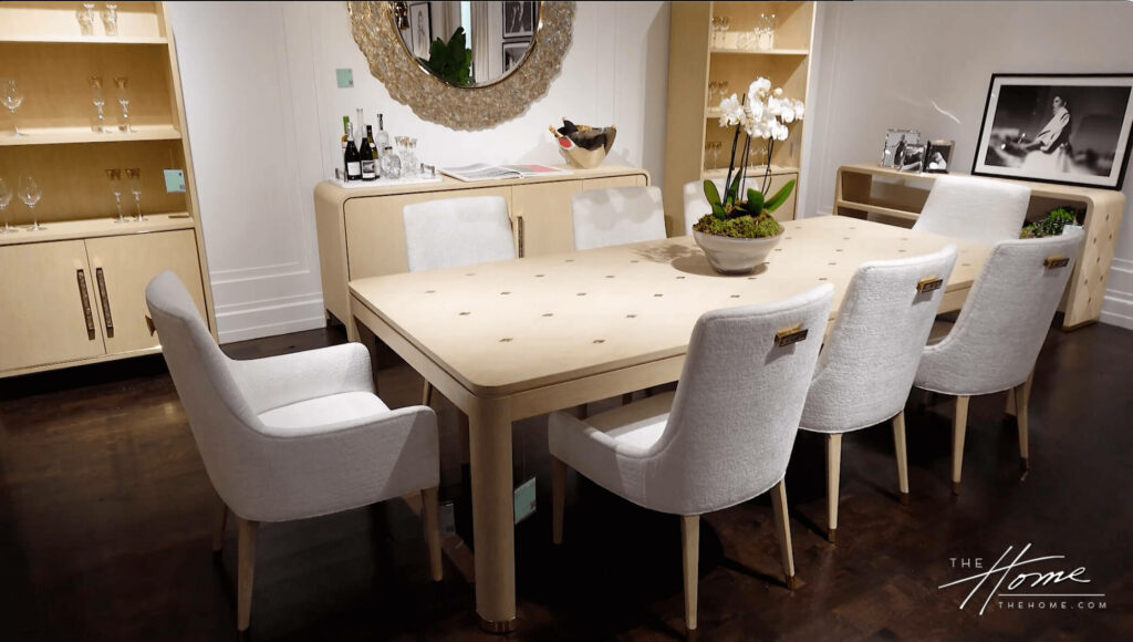 image of dining table set with cream chenille chairs and table with inlay of mother of pearl